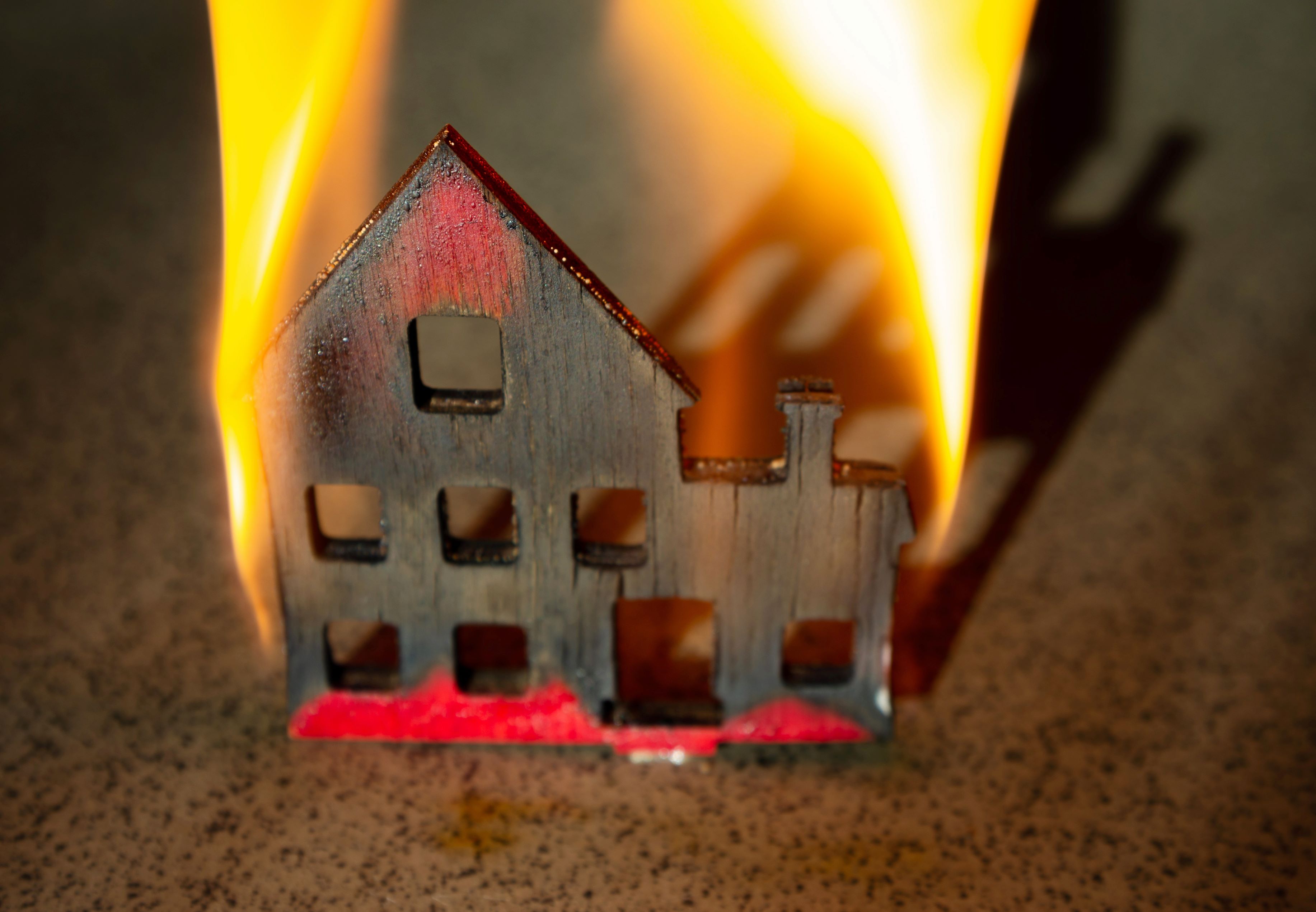 Wooden model house burning